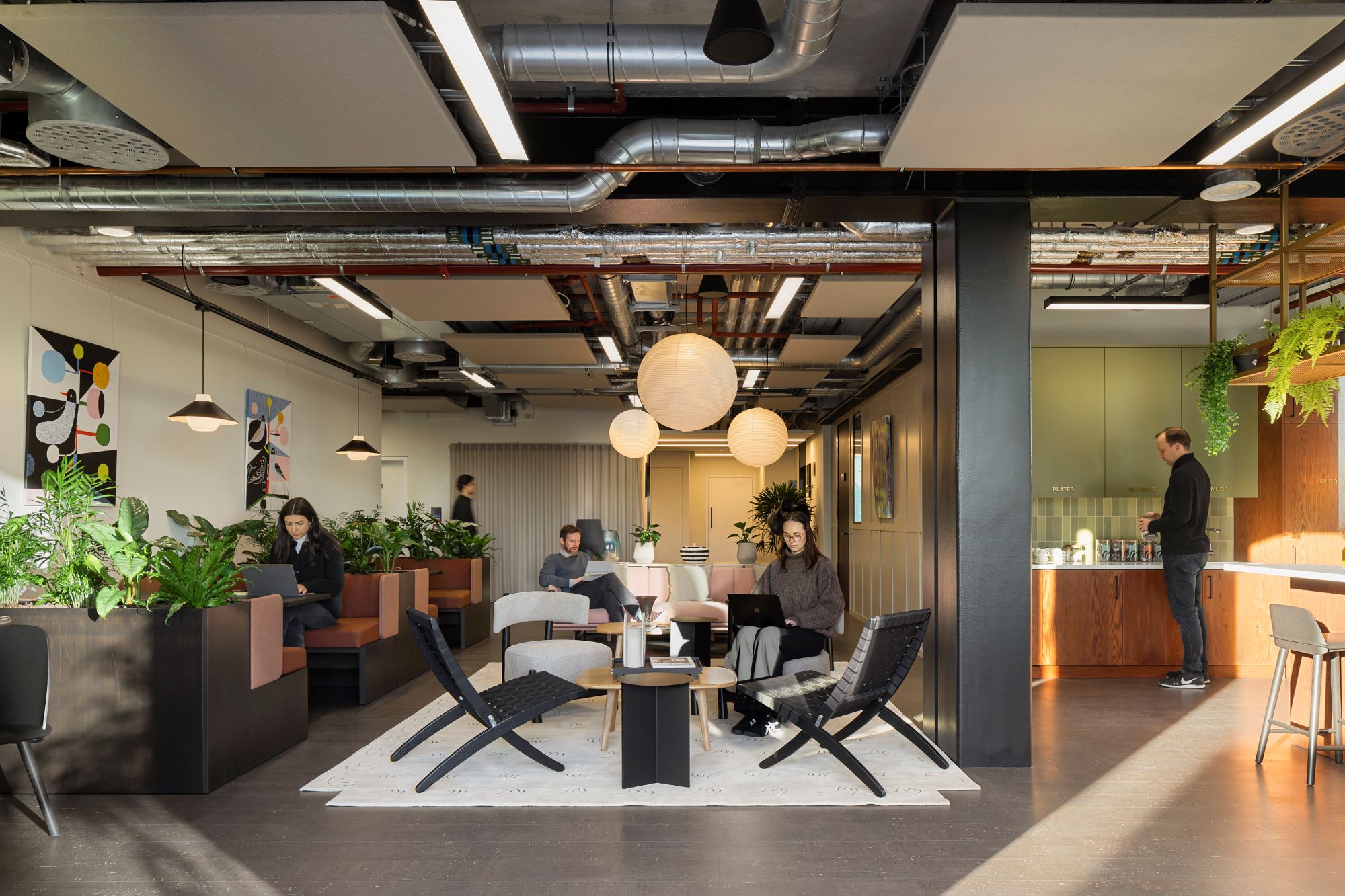 Myo Bankside's communal space with kitchen facilities and seating.
