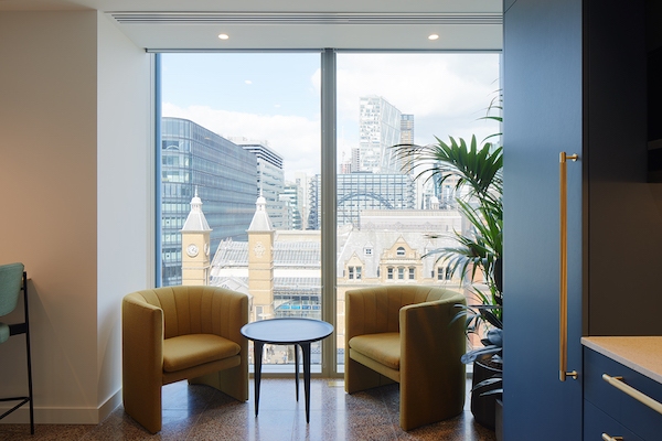 Skyscrapers and buildings from the windows in the kitchen area of Myo's Liverpool street offices.