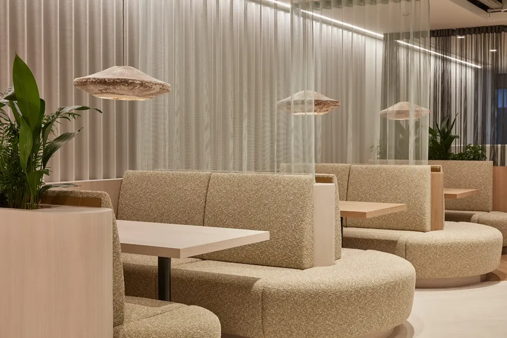 Seating booths and overhead lighting at one of Myo's offices.